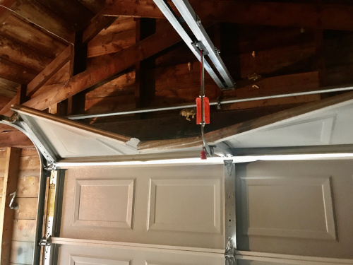 Garage Door Repair Ninja, How Do You Fix A Bent Garage Door Panel