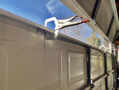 New Westminister S 1 Garage Door Ninja, How Do You Fix A Bent Garage Door